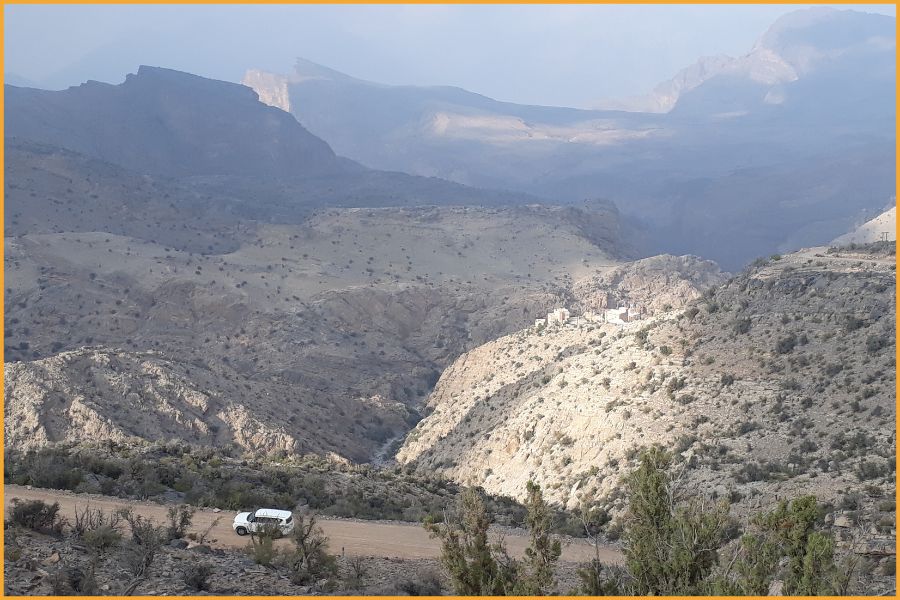 4x4 vehicle navigating a scenic mountain track in Oman’s Hajar Mountains, highlighting the safe and spectacular landscapes families explore in the Arabian Peninsula